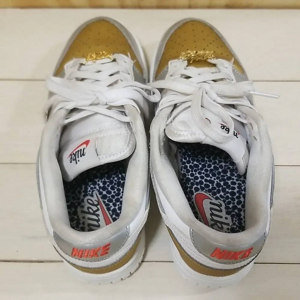 Nike Women's Metallic Gold and Silver Sneakers Women's size 6